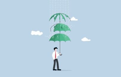 Businessman spreading multi layer umbrella to cover rain