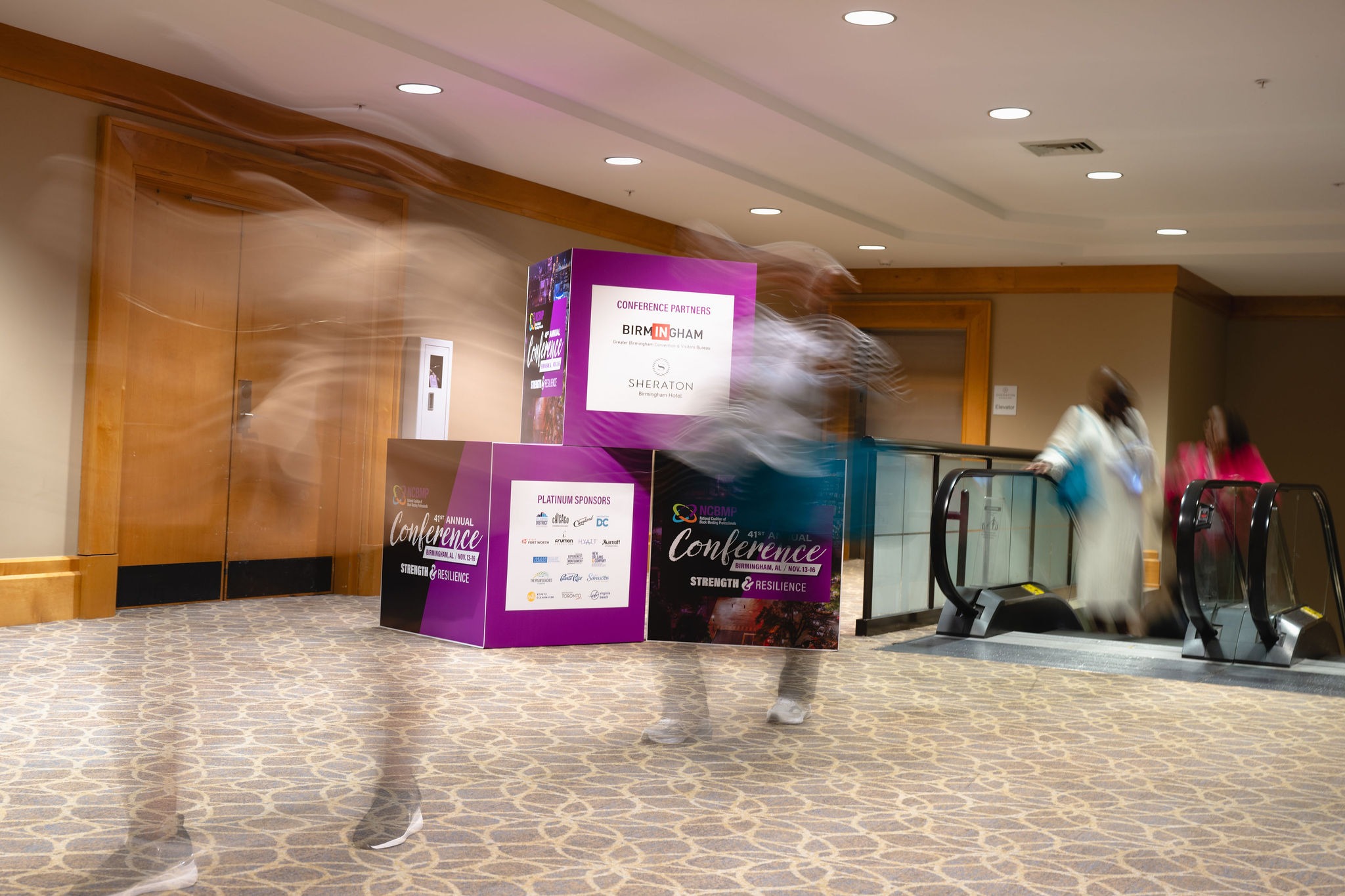 People walking in foyer