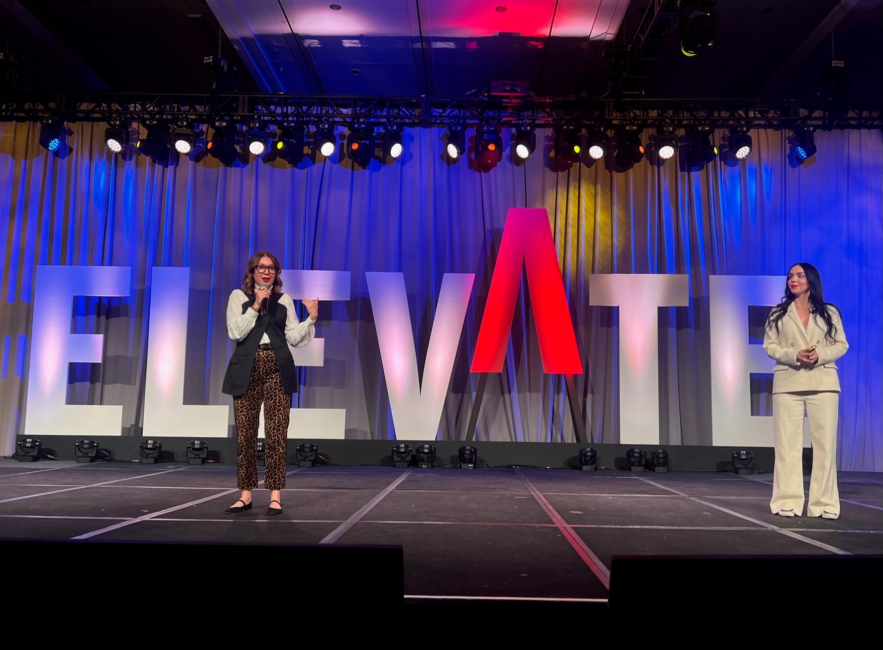 Stage at FICP Elevate 2024 with Megan Henshall and Rachel Lowenstein