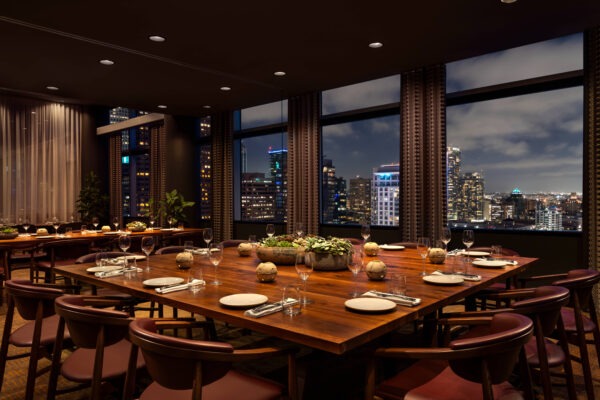 Dinner table at JW Marriott Los Angeles L.A. L.I.V.E. with skyline in background