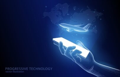 A hand holding a smartphone over which in the form of a hologram a map of the world and a passenger plane