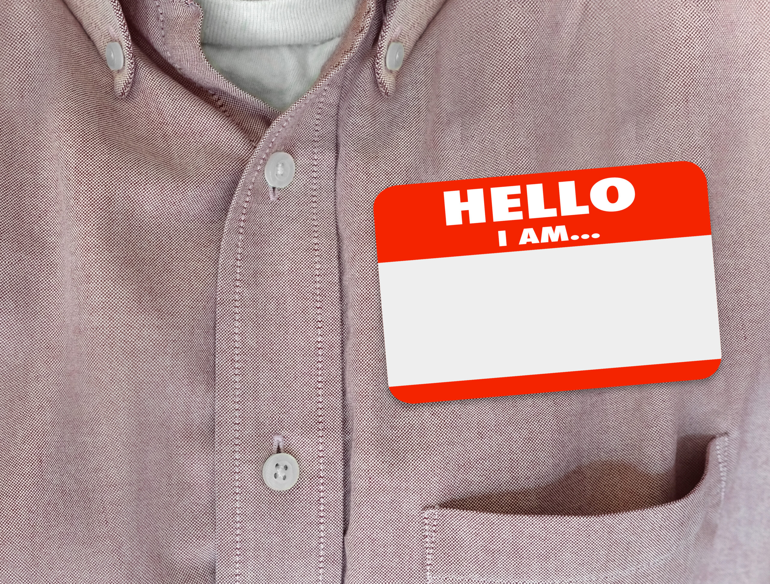 "Hello, I am" sticker on someone's shirt