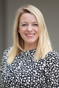 Charlotte Leo wearing black and white polka dot shirt