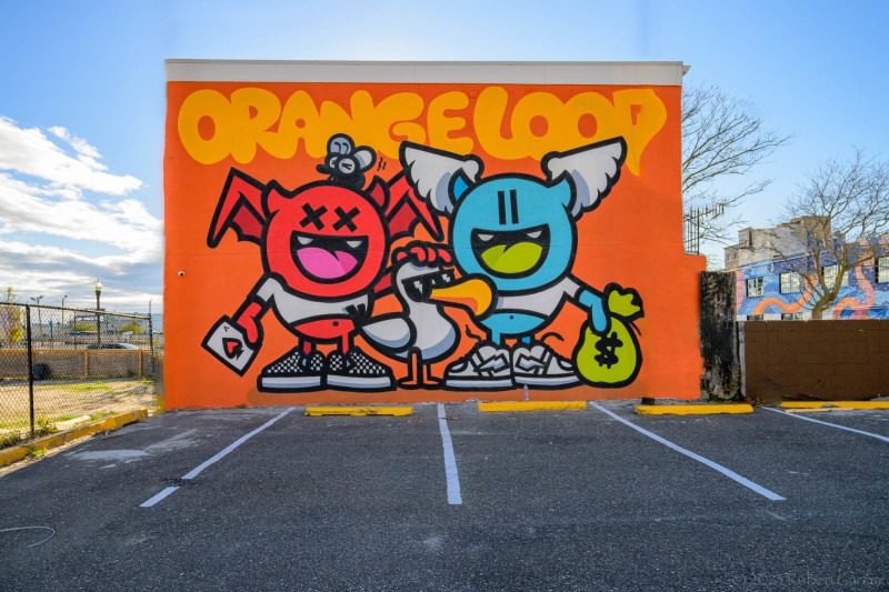 “Orange Loop” mural by Golden 305 & Ange Saravia