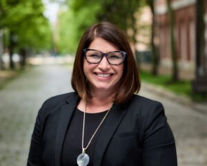 Danielle Dickinson wearing black coat and black shirt