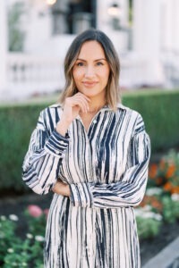 Gabriela Rojo wearing blue and white dress