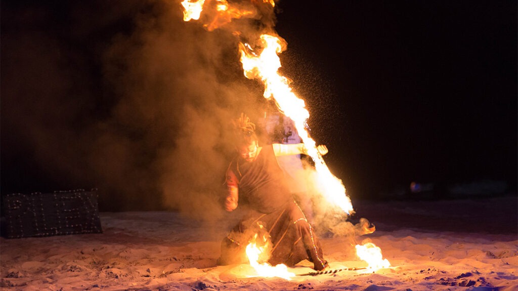 Man playing with fire