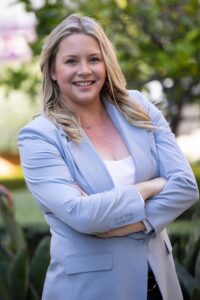 Jackie Ash blue sport coat and white shirt