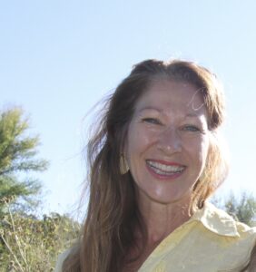 Kimberly Findlay wearing yellow sleeveless shirt