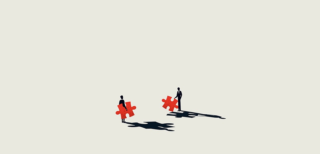 illustration of two small people holding puzzle pieces